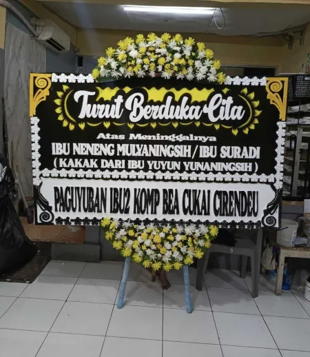 Papan Bunga Duka Jembatan Besi